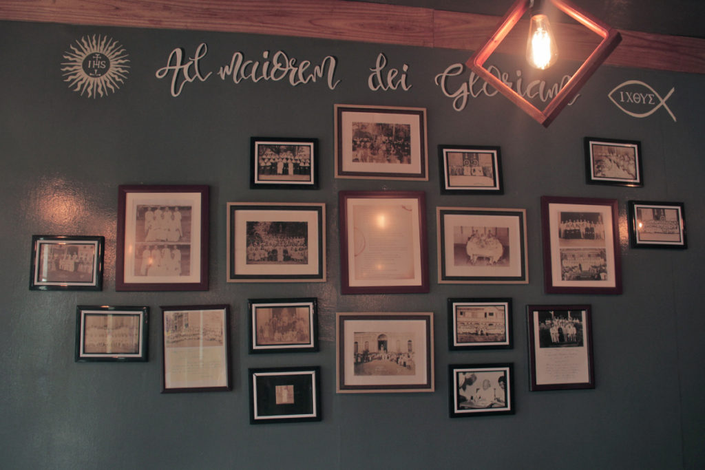 wall of framed photos