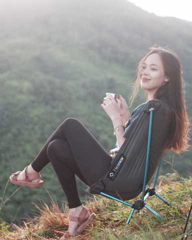 girl camping with coffee