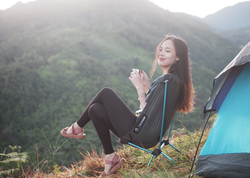 girl camping with coffee