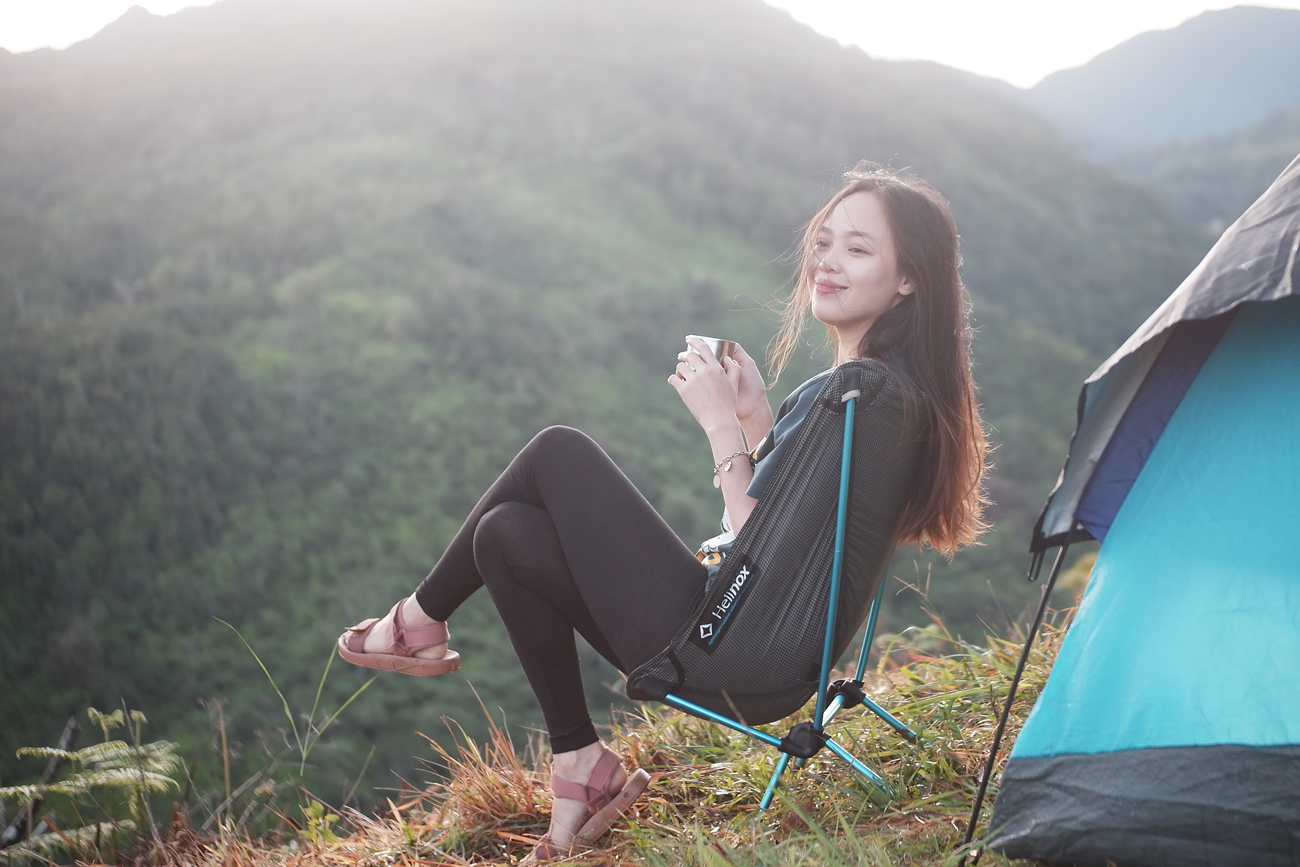 girl camping with coffee