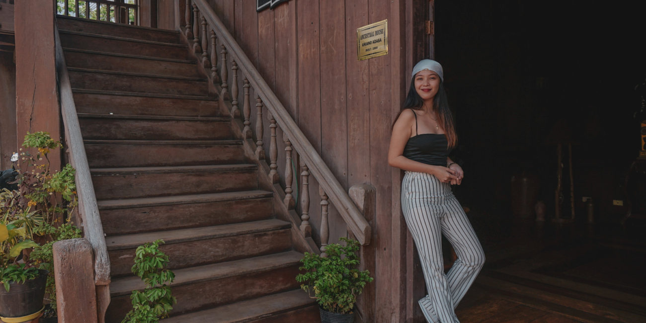 girl on vintage house