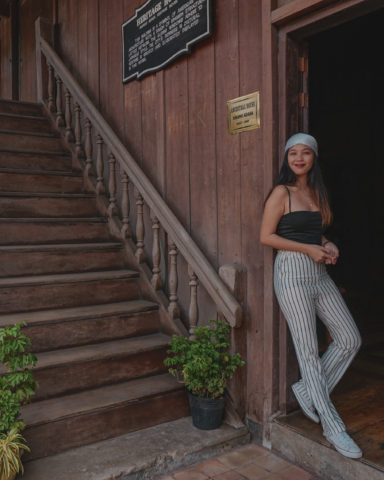 girl on vintage house