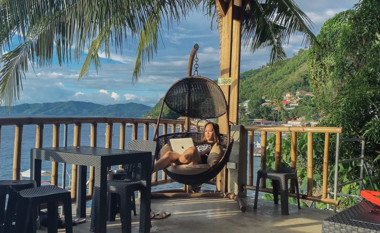 FREEDIVE TRIBE PH: Camp, Dive, Yoga, and Work from the Beach in Batangas 1 girl with laptop
